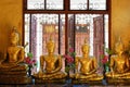 Close-up shot of Golden Buddha image in Thai Buddhist temple. Royalty Free Stock Photo