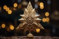 close-up shot of a golden star tree topper, positioned at the peak of a Christmas tree Royalty Free Stock Photo