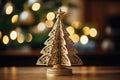 close-up shot of a golden star tree topper, positioned at the peak of a Christmas tree Royalty Free Stock Photo