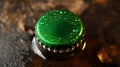 Green beer bottle cap with water drops closeup isolated on black background Royalty Free Stock Photo