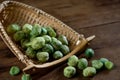 close up shot of green pea on wood background studio shot