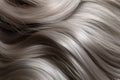 close up shot of grey wavy short shiny hair texture background