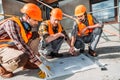 close-up shot of group of builders having conversation about