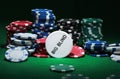 Close up shot of group poker chips on green table Royalty Free Stock Photo