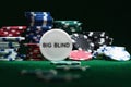 Close up shot of group poker chips on green table Royalty Free Stock Photo