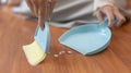 Close-up shot of hand holding a broom Royalty Free Stock Photo