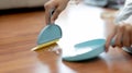 Close-up shot of hand holding a broom Royalty Free Stock Photo