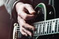 Close up shot of Hands of man playing electric guitar Royalty Free Stock Photo