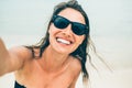 Close up shot of happy smiling female tourist. Poses for selfie Royalty Free Stock Photo