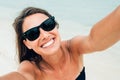 Close up shot of happy smiling female tourist. Poses for selfie Royalty Free Stock Photo