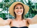 Close up shot of happy smiling female tourist. Poses for selfie Royalty Free Stock Photo