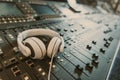 close-up shot of headphones on graphic equalizer Royalty Free Stock Photo