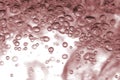 A close-up shot highlighting the intricate details and movement of effervescent bubbles suspended in a fluid with a warm color Royalty Free Stock Photo