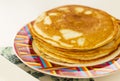 Close up shot of a home made pancakes on colorful plate. Food Royalty Free Stock Photo