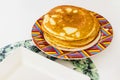 Close up shot of a home made pancakes on colorful plate. Food Royalty Free Stock Photo