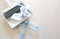 A close up shot of household floor cleaning items and paper ,bottle Royalty Free Stock Photo