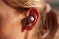 Human Ear with Wireless Earbud Technology Personal Style Royalty Free Stock Photo