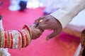 Close-up shot of Indian bride and groom holding hands Royalty Free Stock Photo