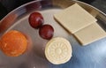 Close-up shot of Indian sweets like Ladoo, gulab jamun, Barfi and peda etc during Samba Dasami Festival