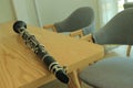 Close-up shot of a jazz clarinet instrument on a wooden table