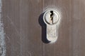 Close up shot of the keyhole on a brushed metal doorknob