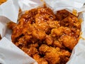 Close up shot of Korean style deep fried popcorn chicken