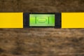 Shot of a level tool , yellow block level with bubble clipping path included. Royalty Free Stock Photo