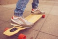 Close up shot longboarder in action Royalty Free Stock Photo