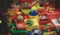 Close up shot of a lot of Merry Christmas eve wrapped present gift boxes stack with colorful ribbons and bows with decoration Xmas Royalty Free Stock Photo