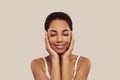 Close up shot of lovely African American woman with clear sooth skin portrait