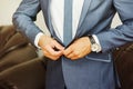 Close-up shot of a man dressed in formal wear .