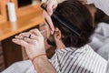 close-up shot of man getting haircut Royalty Free Stock Photo