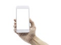 Close-up shot of Man hand holding white mobile smartphone with blank white screen display for mockup isolated on white background Royalty Free Stock Photo