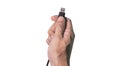 Close up shot, Man hand showing the black USB data cable Royalty Free Stock Photo