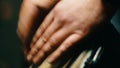 Close up shot of a man hands playing on a Bongo drum. 4k video
