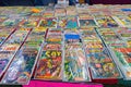 Close up shot of many old comic books selling in a Flea Market