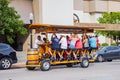 Close up shot of many people playing Cowtown Cycle Party car