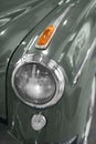 Close up shot of a Mercedes 220S blue car`s headlight which produced in 1958. Editorial Shot in Izmir Turkey