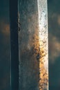 A close-up shot of a metallic object with a blurred background Royalty Free Stock Photo