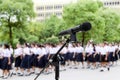 Microphone close up shot on Blurred Students high school walking for Background Royalty Free Stock Photo