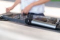 Close up shot of a microphone next to DJ playing music at outdoor event. Mic next to deejay mixing at the party Royalty Free Stock Photo