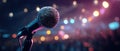 Close-up Microphone on Stage with Colorful Concert Lights Royalty Free Stock Photo