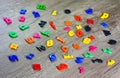 Plastic Letters Alphabet Images on wooden table Royalty Free Stock Photo