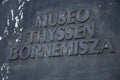 Close-up shot of the name of Thyssen Bornemisza Museum on the wall