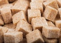 Close-Up shot of natural brown sugar cubes on white background Royalty Free Stock Photo