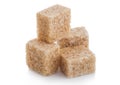 Close-Up shot of natural brown sugar cubes on white background Royalty Free Stock Photo