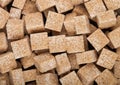 Close-Up shot of natural brown sugar cubes on white background Royalty Free Stock Photo