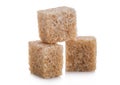 Close-Up shot of natural brown sugar cubes on white background Royalty Free Stock Photo