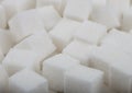 Close-Up shot of natural white sugar cubes on white background Royalty Free Stock Photo