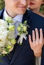 Close up shot of newlyweds embracing eachother. Just married husband and wife close up. Wedding and love concept.